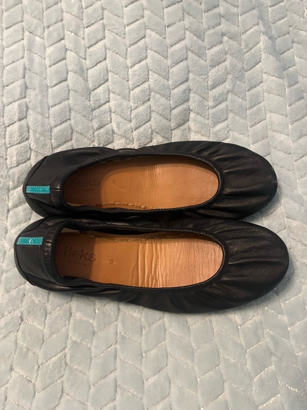 Tieks Black Leather Ballet Flats with Teal Heel Tab